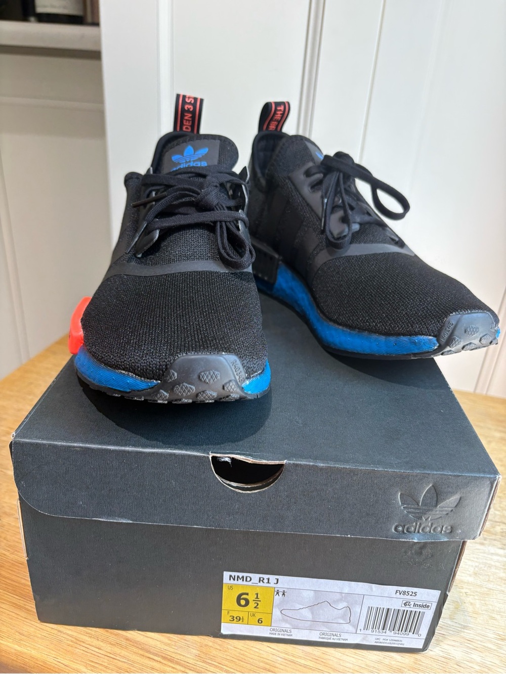 adidas Women’s Black Sneakers with Blue and Red Accents